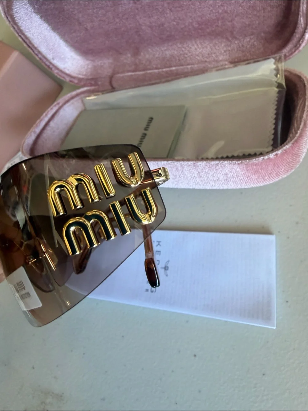 Miu Miu Women's Rimless Sunglasses in Brown